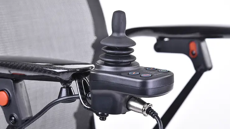 Frontal image of the Quickie® Q50 R Carbon Joystick Controller - Joystick controller for the Quickie Q50 R Carbon power wheelchair, featuring a simple and intuitive design for easy operation.