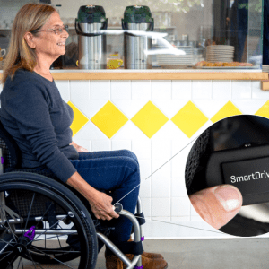 Image of the SmartDrive MX2+ Switch Control - Compact, wireless switch control for power wheelchairs, enabling users to activate various functions with a simple press or touch.