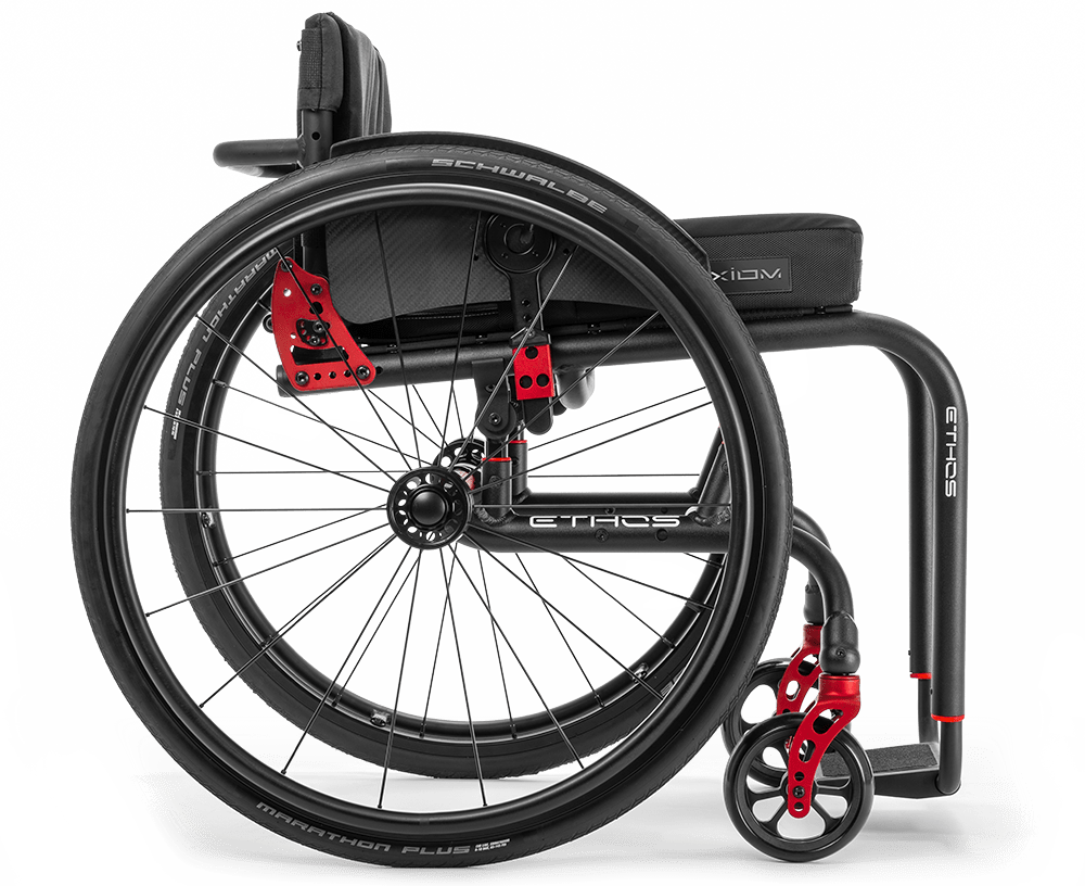 Right side view of the versatile black and red Custom Rigid Ethos Wheelchair.