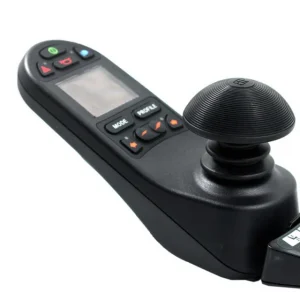 Top left side close-up photo of a black, dome-shaped joystick handle made of rubber. The handle has a low profile and ribbed texture.