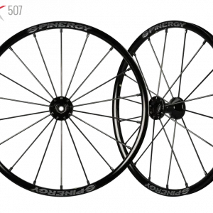 Frontal and side image of the Spinergy SLX 507 Wheelchair Wheel - High-performance, lightweight wheelchair wheel featuring a 7-spoke design for optimal rigidity and responsiveness.