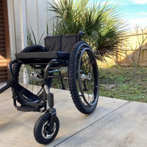 Image of the TiLite CR1 Carbon Fiber Ultra-Light Wheelchair - Lightweight, high-performance rigid wheelchair frame made from carbon fiber, designed for customizable seating and maneuverability.