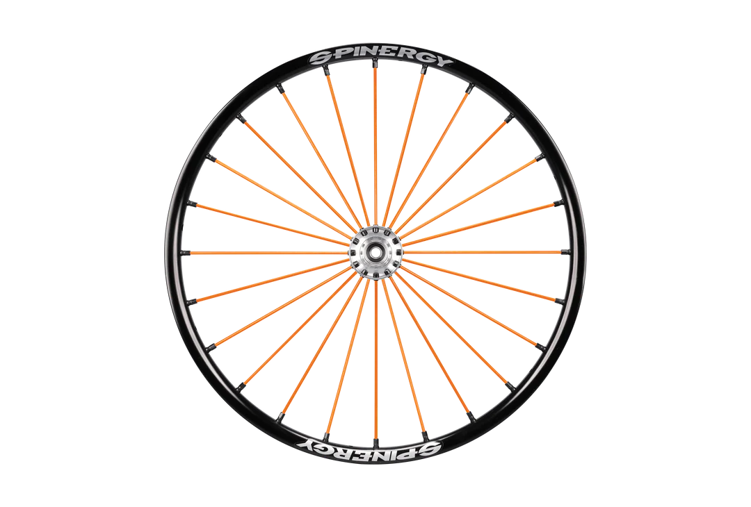 Frontal view of the orange Spinergy SLX 24 Spoke Wheelchair Wheel - Durable and high-performance wheelchair wheel with 24 spokes for maximum stability and responsiveness.