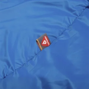 Close up view of the Kinetic Balance QT Blue Winter Jacket - Blue, wheelchair-friendly jacket with a unique 50/50 fit, designed for warmth, comfort, and mobility.